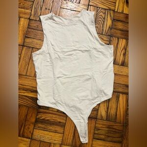 Nuuds Cream One-Shoulder Top